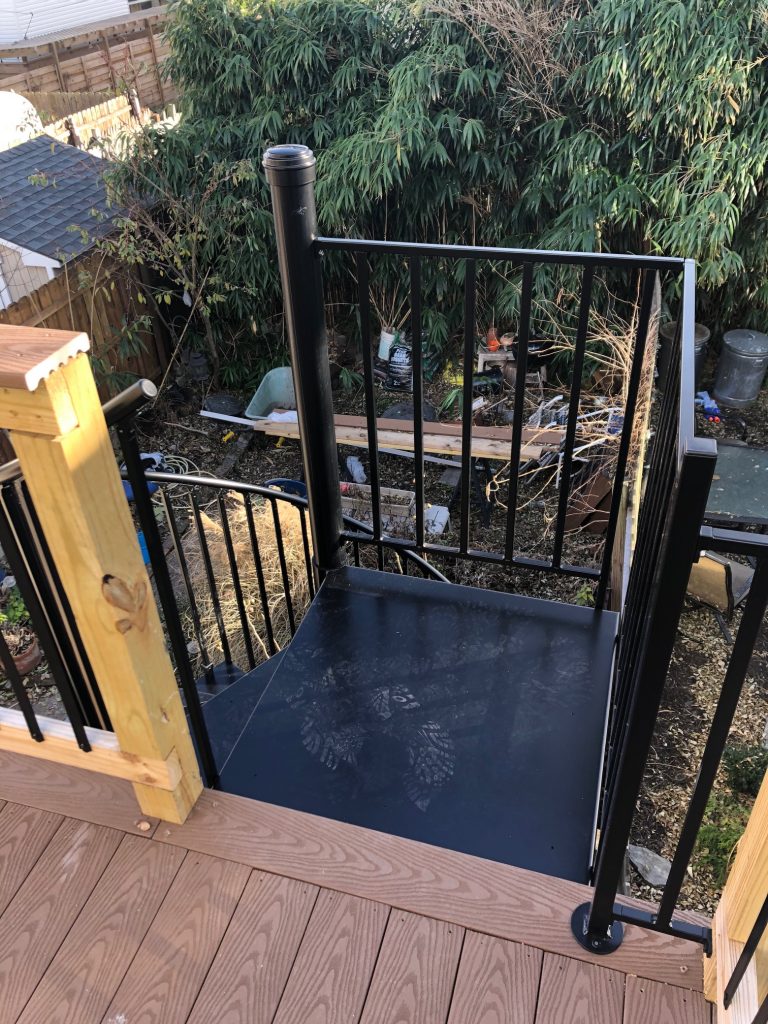 Powder coated spiral stair landing for commercial business